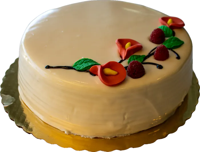 Caramel cake with cherry decoration