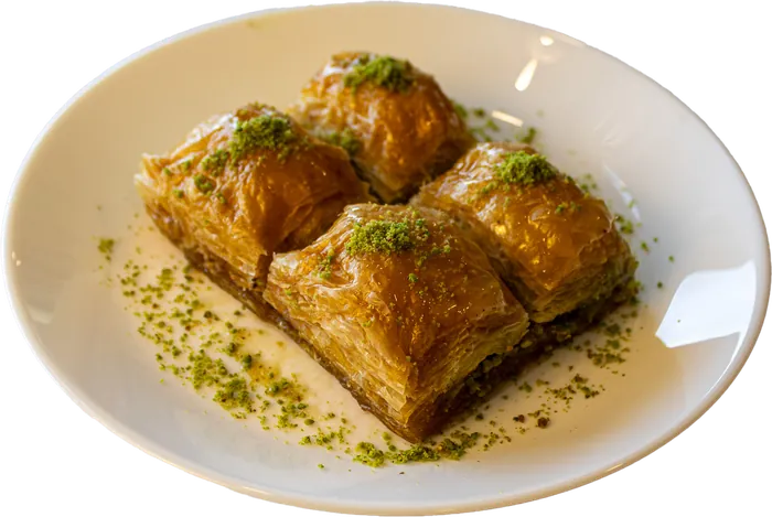 Pistachio baklava squares on a plate
